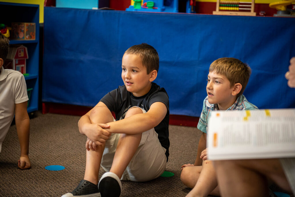 Children listening to Sunday School teacher