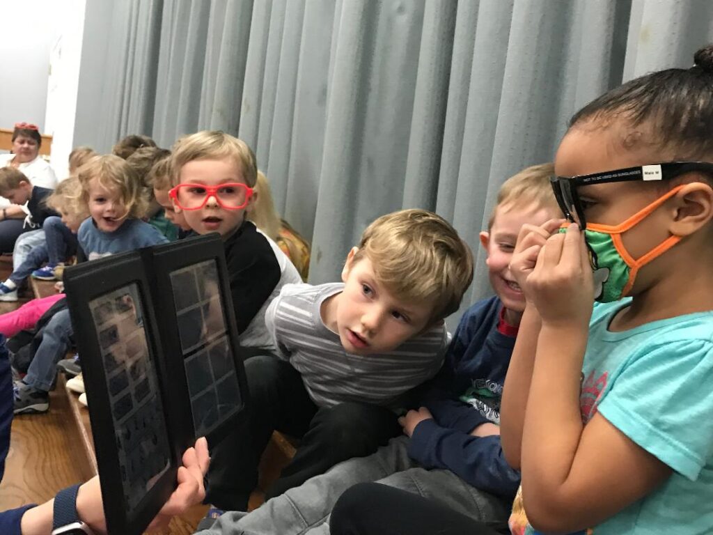 Children looking at photos