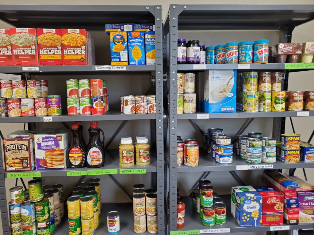 Shelves stocked with canned goods